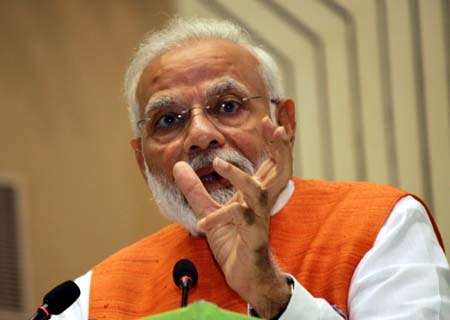 <p>New Delhi: Prime Minister Narendra Modi addresses during a programme where he presented Yoga Awards, released 12 commemorative postal stamps and launched 10 AYUSH Health and Wellness…