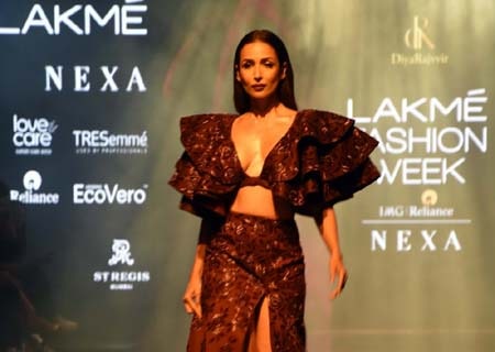 <p>Mumbai: Actress Malaika Arora walks the ramp to showcase designer Diya Rajvir's creations at the Lakme Fashion Week Winter/Festive 2019 in Mumbai on Aug 25, 2019.</p>
