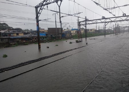 <p>Mumbai: A view of the water-logged railway tracks after heavy rains lashed Mumbai's Andheri on June 28, 2019. Monsoon made a grand entry in Mumbai and surrounding areas on Friday,…