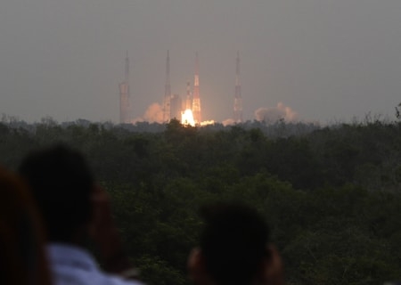 <p>Sriharikota: People watch as the Polar Satellite Launch Vehicle-XL (PSLV-XL) rocket carrying advanced earth observation satellite Cartosat-3 and 13 US nanosatellites lifted off…