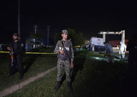 <p>Islamabad: Security officers stand guard at the firing site in Islamabad, capital of Pakistan, on Aug. 21, 2019. At least two policemen were killed and another was injured when…