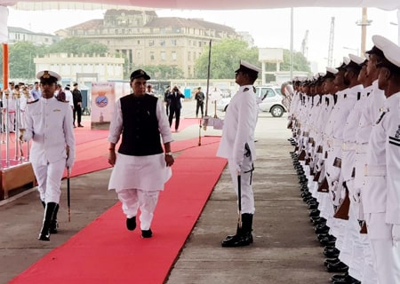 <p>Mumbai: Defence Minister Rajnath Singh inspects the Guard of Honour on his arrival at the commissioning ceremony of India's second Scorpene-class attack submarine INS Khanderi…