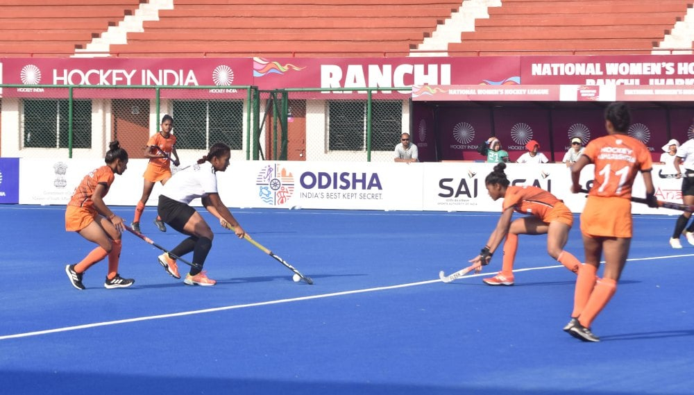 <p>Women’s Hockey Players of Maharashtra (Orange) and Manipur (White) in action and celebrate after Maharashtra scored goal against Manipur during National Women’s Hockey Championship…