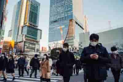 Japan reports Covid spike, medical system overwhelmed