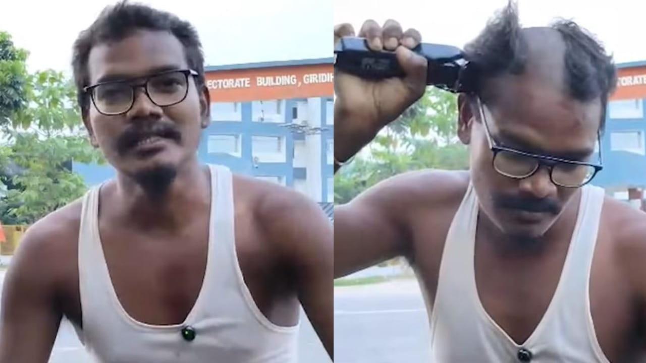 land-dispute-protest-takes-unusual-turn-as-man-shaves-half-his-hair-and-moustache-outside-giridih-dc-office