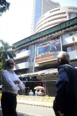 Equity indices settle largely steady, Nifty metal top loser