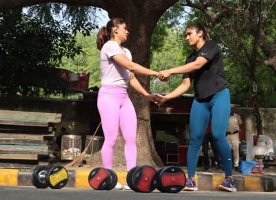 Dumbbells, neck plank & stretching: Protesting wrestlers turn Jantar Mantar into training centre
