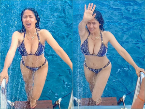 salma-hayek-s-family-just-won-t-let-her-pose-for-bikini-shoot-in-peace