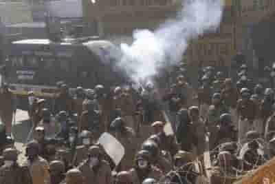 It's tense: Police use tear gas, water cannons & farmers pelt stones at Singhu