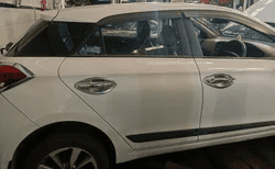 District admn seizes illegally parked car on Main Road