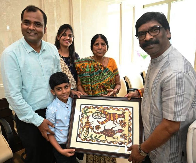 Six year old boy hands over Sohrai painting to CM