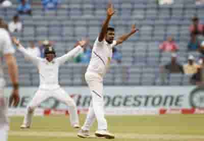 Pune Test: Ashwin, Saha help India inch closer to win