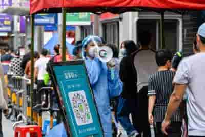 As Shanghai struggles with Covid, cases spike in Beijing