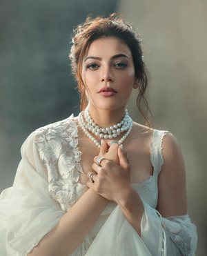 kajal-aggarwal-s-ode-to-her-favourite-gorgeous-swans-as-she-stuns-in-ivory-lehenga
